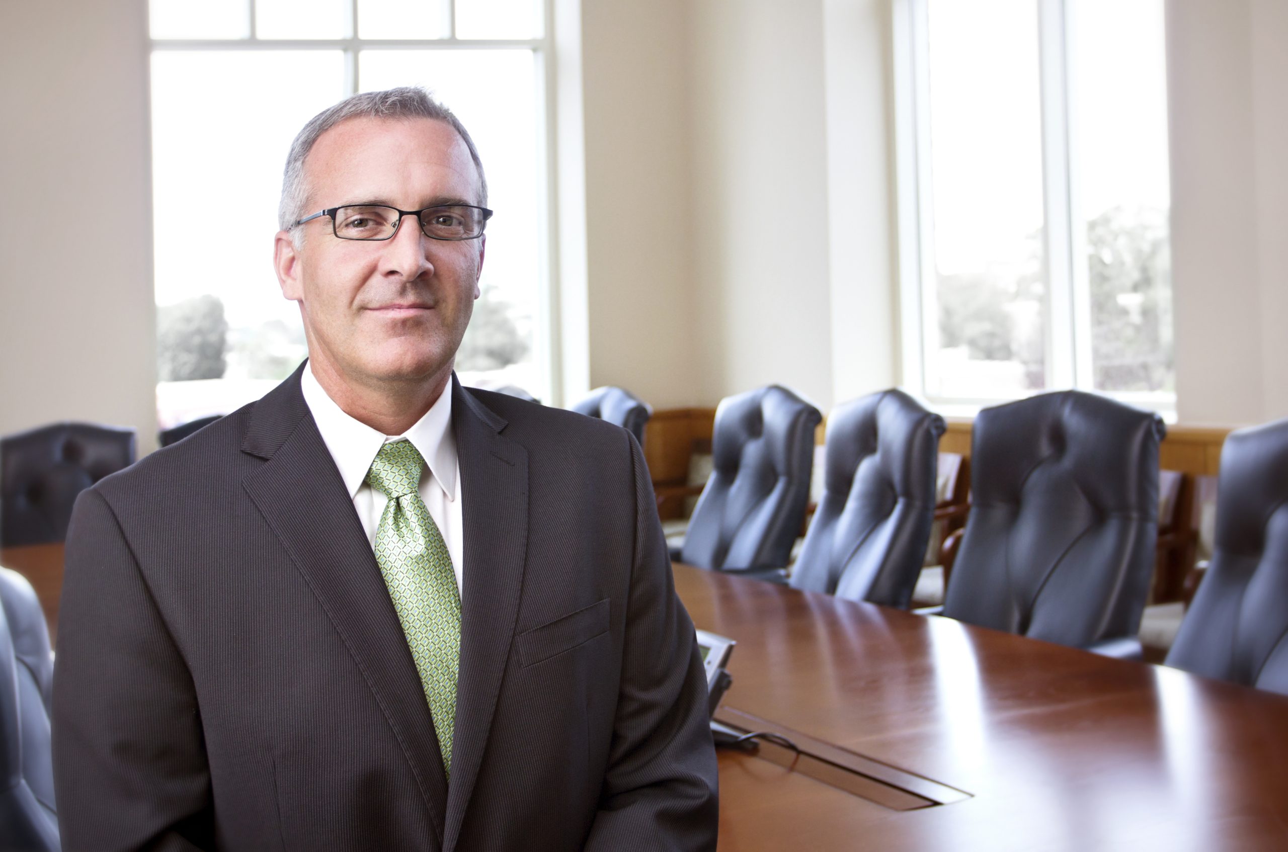 man with a suit looking confident